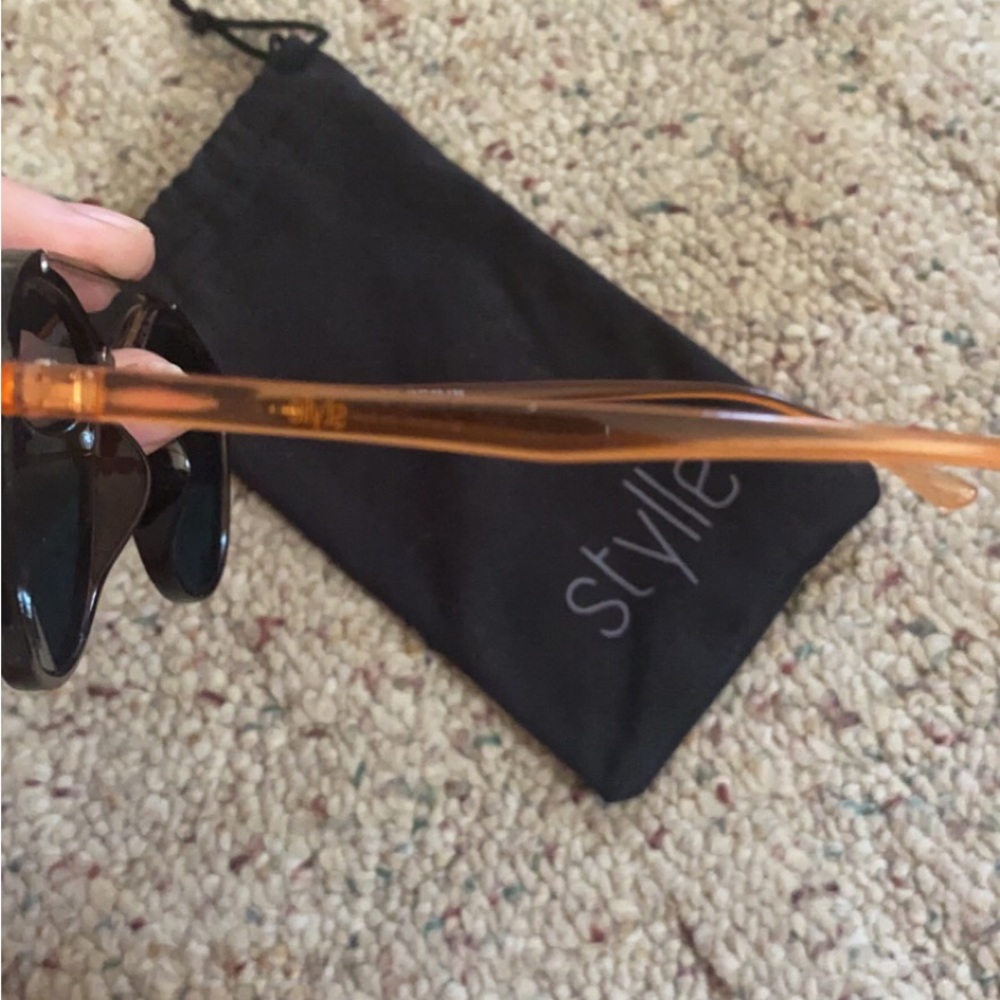 Stylle Brand sunglasses with protective carrying sack